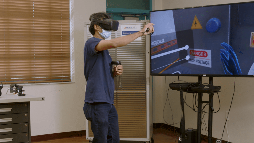 Student in Amskills classroom with VR