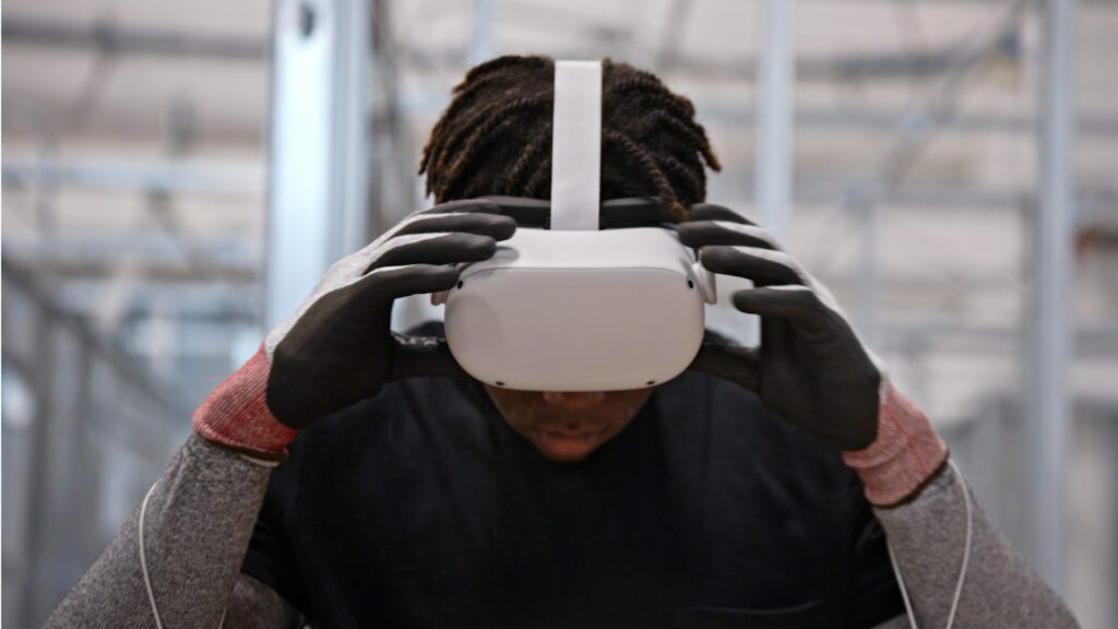 Student in headset at Trio